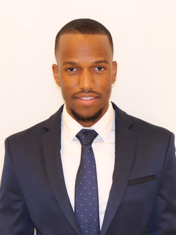 Portrait of Travis Morrison, CFO & Treasurer.